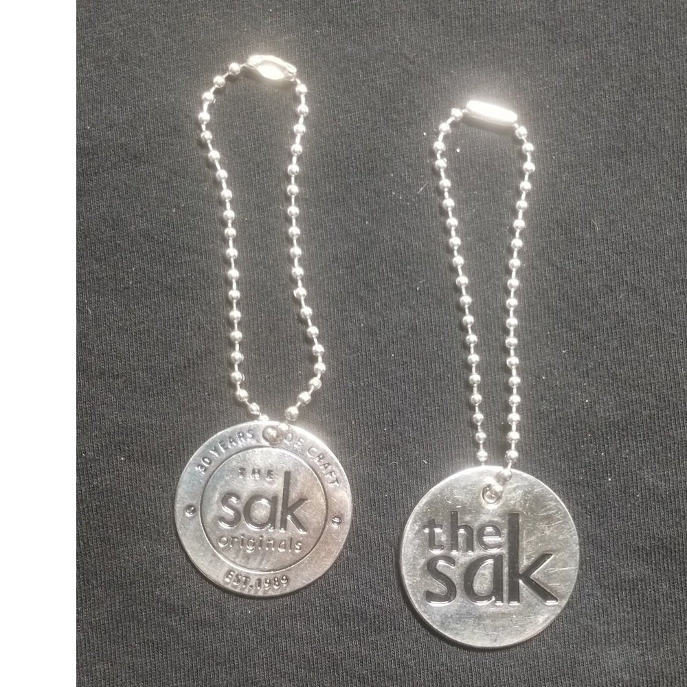 The Sak Silver Tone Logo Bag Charm Hangtag Set of 2